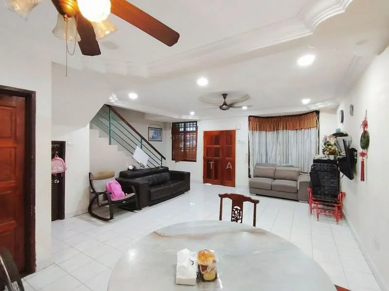 Living features: white painted walls, ceramic tile flooring, tray ceiling with recessed lighting, 5-blade ceiling fan, sofa in grey fabric, coffee table, TV console, wall-mounted TV, large window with sheer curtains, decorative plants, wall clock, staircase leading to upper floor; style: modern. Dining features: round dining table, wooden dining chairs, table centerpiece with decorative items; style: modern.