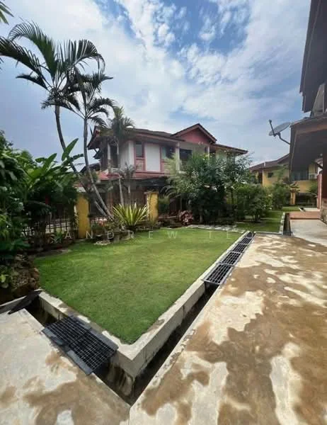 Exterior type: detached bungalow; features: manicured lawn, tropical landscaping, paved walkway, surrounded by greenery, two-storey building, gutter drainage system, outdoor space with plants, patio area; style: traditional.