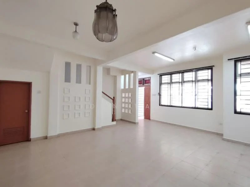 Room features: white painted walls, tile flooring, large windows with black frames, ceiling light fixture, wall-mounted light fixture, staircase with wooden railing, door with red finish, decorative wall panels, multiple light sources, open layout; style: modern.