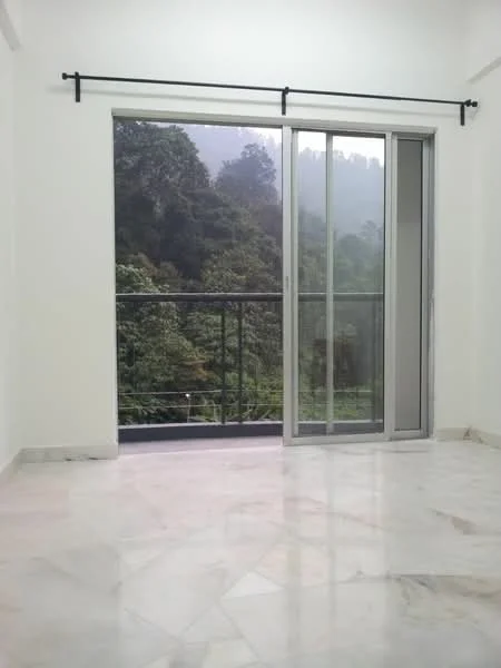 Room features: white painted walls, marble flooring, floor-to-ceiling sliding glass door, black railing on balcony, view of greenery; view: garden.