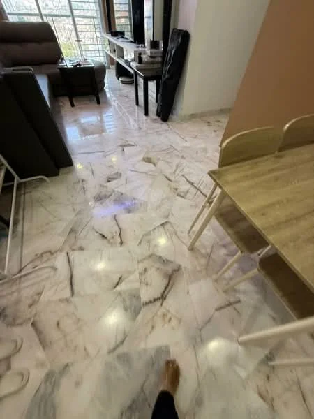Living features: marble tile flooring, sofa in beige, coffee table, TV console, wall-mounted TV, dining table with chairs, large windows, decorative wall, light-colored walls; style: modern; view: city.