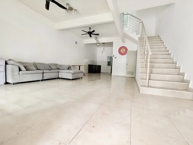 Living features: large grey fabric sectional sofa, white painted walls, polished ceramic tile flooring, 5-blade ceiling fan, recessed downlights, open layout, staircase with white risers, glass railing, decorative wall clock, large windows for natural light; style: modern. Room features: white painted walls, polished ceramic tile flooring, open layout, kitchen area visible in background.