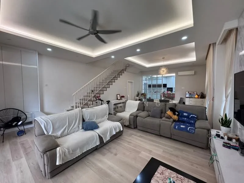 Living features: 5-blade ceiling fan with integrated LED light, recessed downlights, light-coloured wooden flooring, grey sectional sofa, 2-seater fabric sofa with white throw covers, coffee table, TV console, wall-mounted TV, decorative items on console, staircase with wooden railing, open layout to kitchen, large windows with natural light; style: modern.