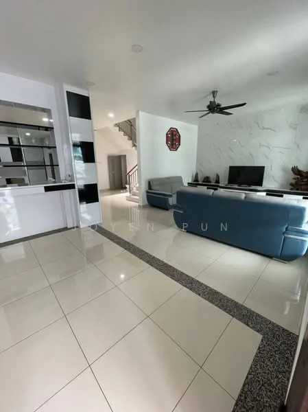 Living features: large blue sectional sofa, white wall with decorative paneling, flat-screen TV on console, ceiling fan with light, marble tile flooring, decorative wall clock, open layout to staircase, glass display shelves, neutral color scheme, decorative wall art; style: modern.
