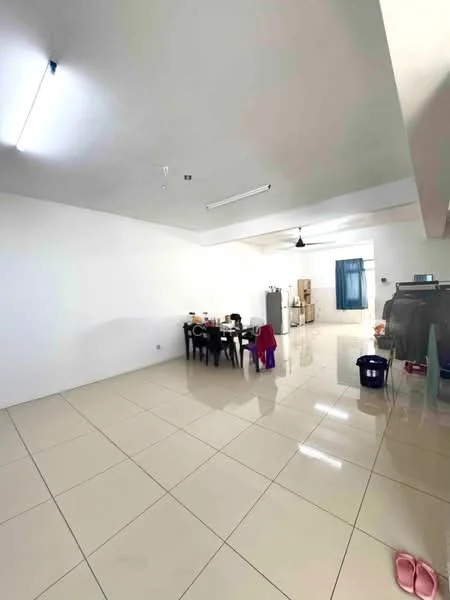 Room features: white painted walls, glossy ceramic tile flooring, recessed ceiling lights, single ceiling fan, dining table with chairs, kitchen cabinets visible in background, refrigerator visible in background, blue curtain on window, laundry basket, clothing on chairs; style: modern.