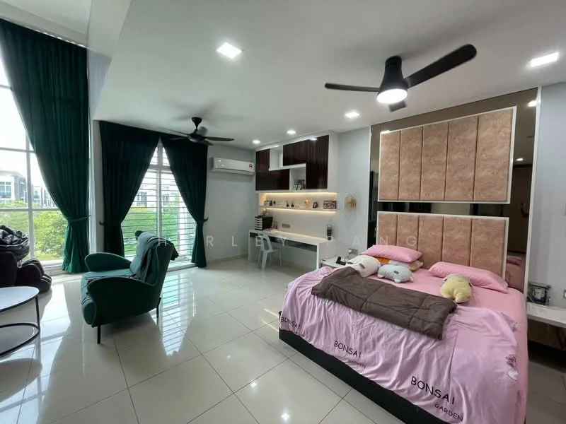 Bedroom features: king-size bed with pink bedding, upholstered headboard, two bedside pillows, study desk with chair, wall-mounted shelves, floor-to-ceiling windows, green curtains, ceiling fan with light, recessed downlights, white tiled flooring, green accent chair, decorative wall art; style: modern; view: garden.