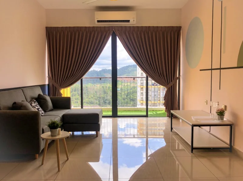 Living features: grey fabric sofa, round coffee table, white TV console, floor-to-ceiling windows, curtains in brown, recessed downlights, wall-mounted air conditioning unit, glossy tile flooring, decorative wall with circular patterns, green view from window; style: modern; view: mountain.