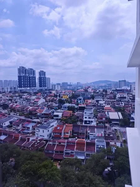 Exterior type: high-rise condominium; features: city skyline view, mixed residential architecture, high-rise buildings in the background, low-rise houses in the foreground, greenery visible in the landscape, cloudy sky; style: modern.