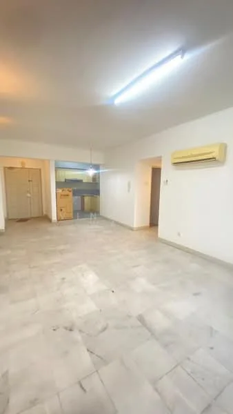 Room features: marble flooring, white painted walls, ceiling with fluorescent lighting, 1 wall-mounted split AC, doorway leading to another room, open layout, neutral color scheme; style: modern.