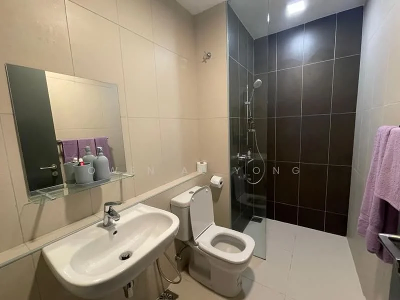 Bathroom features: single-sink vanity with mirror, white ceramic sink, chrome basin mixer faucet, one-piece toilet, glass shower enclosure, rain shower head, handheld shower, grey tiled walls, white tiled flooring, purple towel, toilet paper holder, wall-mounted shelving; style: modern.