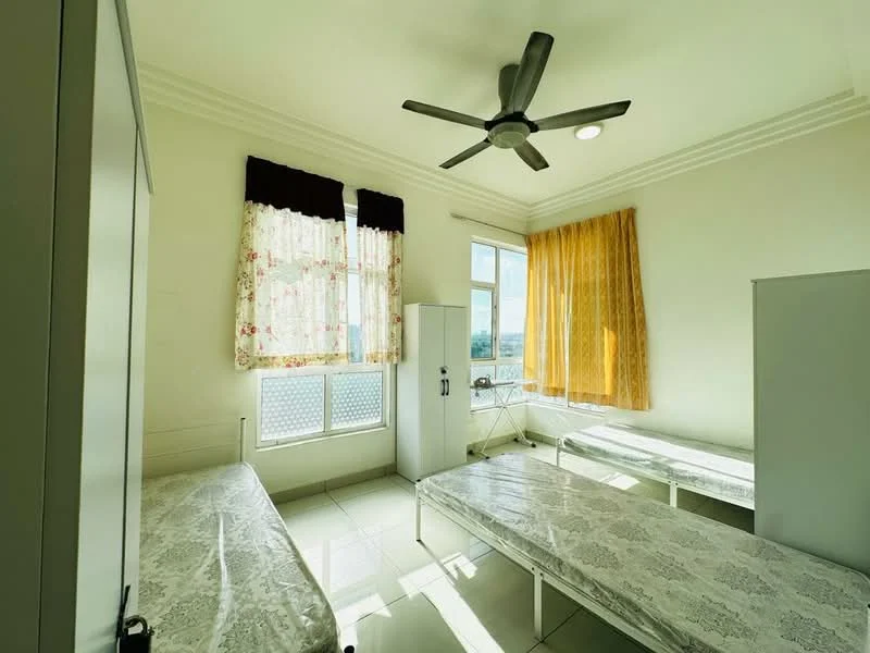 Bedroom features: two single beds with metal frames, white bedding with floral pattern, ceiling fan with 3 blades, white walls, large window with sheer curtains, yellow patterned curtain, built-in wardrobe, tile flooring, refrigerator, natural light from windows; style: modern; view: city.