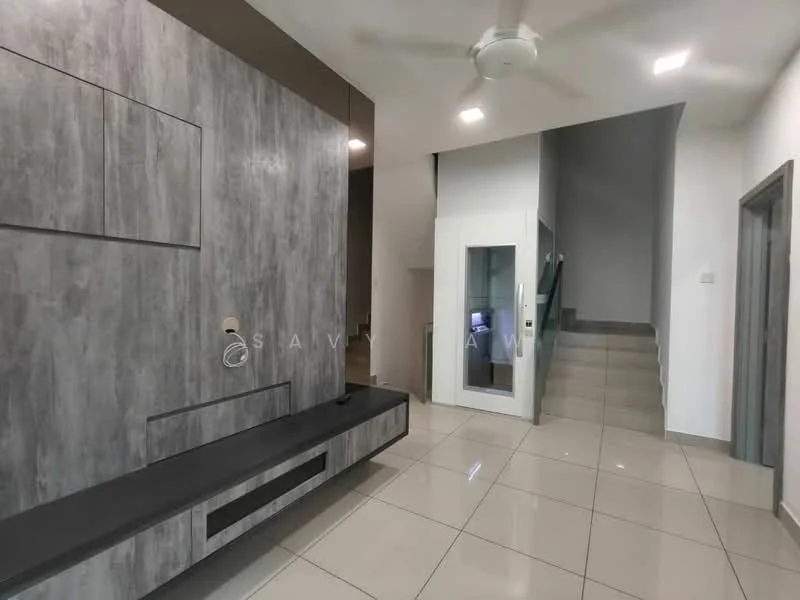 Room features: grey textured wall paneling, black low-profile TV console, white walls, glossy beige floor tiles, ceiling fan, recessed LED downlights, staircase with glass railing, elevator shaft, wall-mounted intercom, open space layout; style: modern.