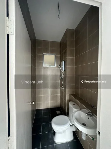 Bathroom features: grey tiled walls, black tiled flooring, one-piece toilet, wall-mounted basin, chrome basin mixer faucet, shower with handheld showerhead, mirror above basin, window for natural light; style: modern.