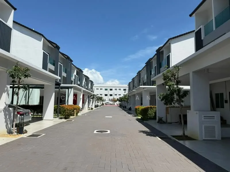 Exterior type: linked terrace house; features: white painted facade, flat roof, 2-storey buildings, manicured landscaping, paved walkway, car porch with awning, visible parking spaces, surrounded by greenery, clear blue sky; style: modern.
