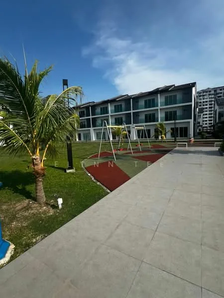 Exterior type: low-rise apartment block; features: manicured lawn, palm trees, playground with swings, paved walkway, green landscaping, two-storey building, balconies on upper floor, glass sliding doors, outdoor lighting, red rubberized surface under swings; style: modern.