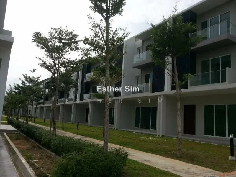 Exterior type: low-rise apartment block; features: modern facade with grey painted walls, balconies with glass railings, manicured lawn, pathway with interlocking pavers, landscaped greenery with small trees, multiple units visible, large windows, contemporary architectural design; style: modern.