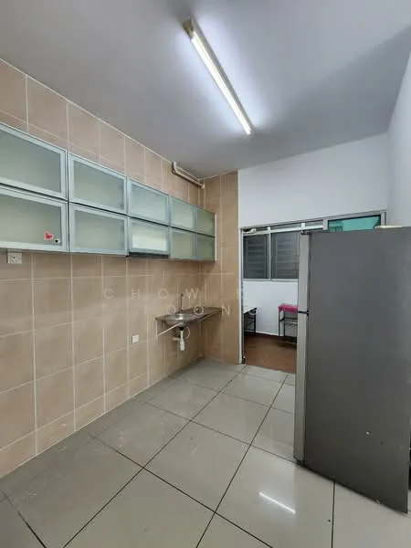 Kitchen features: light grey tiled flooring, beige tiled walls, stainless-steel sink, chrome faucet, wall-mounted cabinets with glass fronts, freestanding fridge, window with metal frame, open space layout; style: modern.