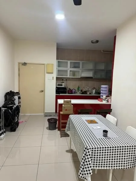 Kitchen features: white painted walls, cream tiled flooring, ceiling lights, kitchen island with red cabinetry, stainless-steel sink, built-in oven, microwave, kettle, checkered tablecloth on dining table, white dining chairs, open shelving, trash bin, various kitchen utensils and appliances visible; style: modern.