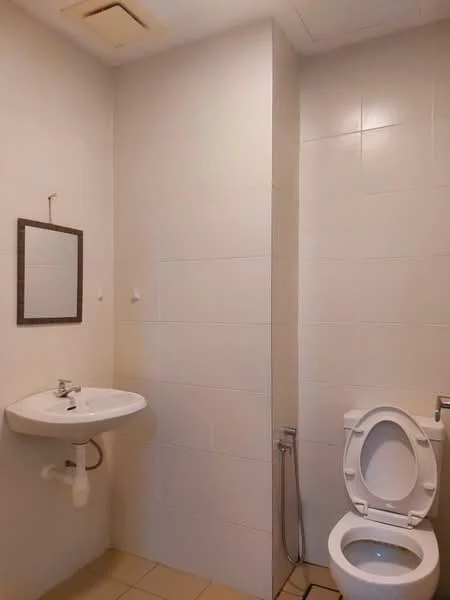 Bathroom features: white tiled walls, cream tiled flooring, single-sink vanity with chrome faucet, mirror above sink, one-piece toilet, bidet spray, exhaust fan, wall-mounted towel holder; style: modern.