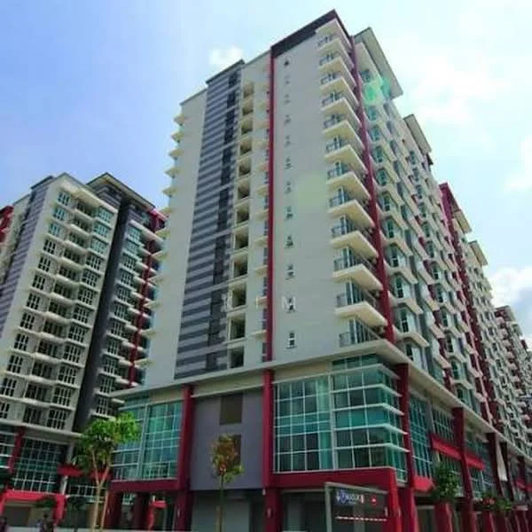 Exterior type: mid-rise condominium; features: glass curtain wall, red and white painted facade, recessed balconies, multiple storeys, large windows, manicured landscaping, entrance with glass doors; style: modern.