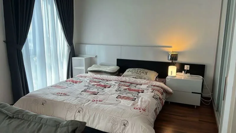 Bedroom features: king-size bed with patterned bedding, upholstered headboard, bedside table with lamp, white nightstand, floor-to-ceiling windows with sheer curtains, dark curtains, wooden flooring, decorative pillow; style: modern; view: city.