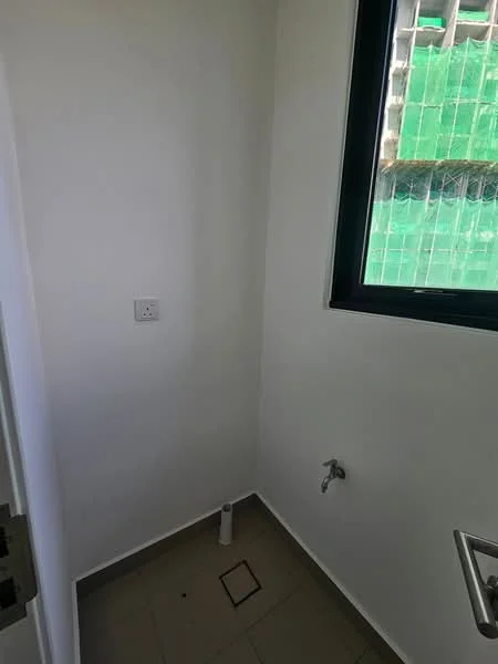 Room features: white painted walls, grey tiled flooring, single window, exposed plumbing, electrical outlet, floor drain.