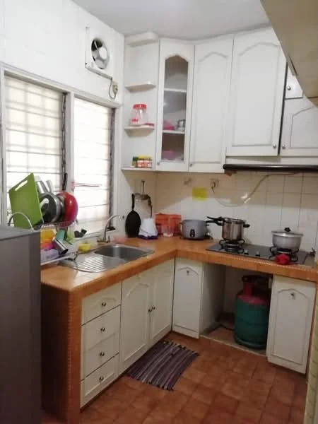Kitchen features: single-bowl stainless-steel sink, chrome pull-down faucet, wood countertop, white cabinetry with raised panel doors, built-in gas stove, freestanding pot with lid, stainless-steel cooking pot, green gas cylinder, refrigerator, tile backsplash, window with blinds, ceramic tile flooring, kitchen rug; style: traditional.
