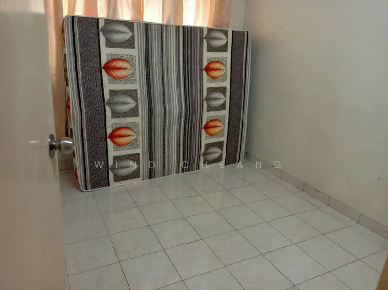 Room features: tiled flooring, white walls, large window with sheer curtains, folded mattress against the wall.