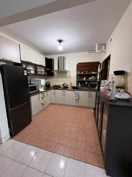 Kitchen features: black refrigerator, built-in oven, microwave, stainless-steel range hood, 4-burner gas hob, laminate countertop, upper cabinets with glass doors, lower cabinets in light grey, tile flooring, single-bowl stainless-steel sink, chrome pull-down faucet, pendant light, window with blinds; style: modern.