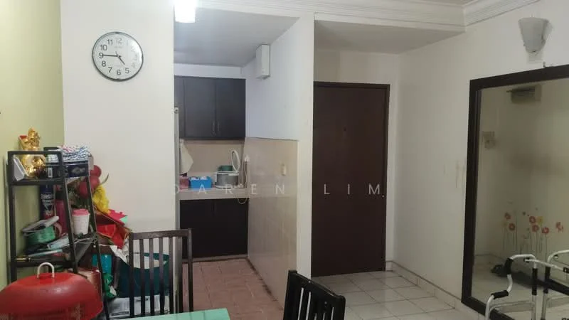 Room features: white painted walls, tile flooring, ceiling with crown moulding, wall-mounted air conditioning unit, kitchen area with countertop, dark wood cabinetry, clock on wall, door to another room, dining table with chairs, open shelving unit, various kitchen items on shelves; style: modern.