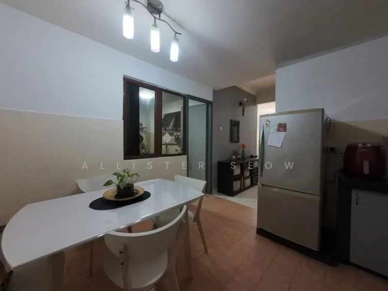 Kitchen features: white painted walls, tile flooring, recessed ceiling lights, dining table with white surface, 4 white dining chairs, stainless-steel fridge, kitchen cabinetry, window with glass panes, countertop, sink, kitchen appliances; style: modern.