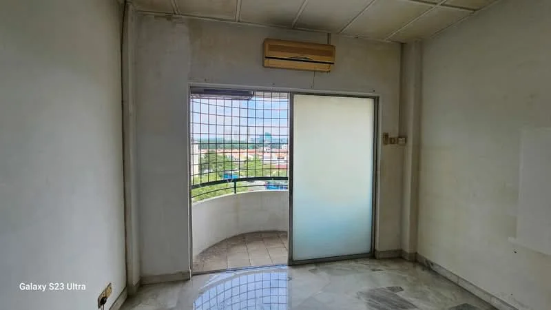 Room features: white painted walls, marble flooring, sliding glass door, floor-to-ceiling windows, window air conditioning unit, balcony access, grid security bars on windows, natural light from window; view: city.