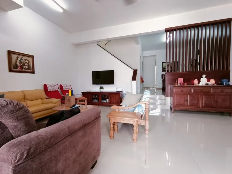 Living features: cream painted walls, white ceiling, marble tile flooring, 3-seater fabric sofa in beige, 2-seater fabric sofa in grey, wooden coffee table, TV console, wall-mounted TV, decorative wooden cabinet, staircase leading to upper floor, area rug with geometric pattern, wall art in frame; style: modern.
