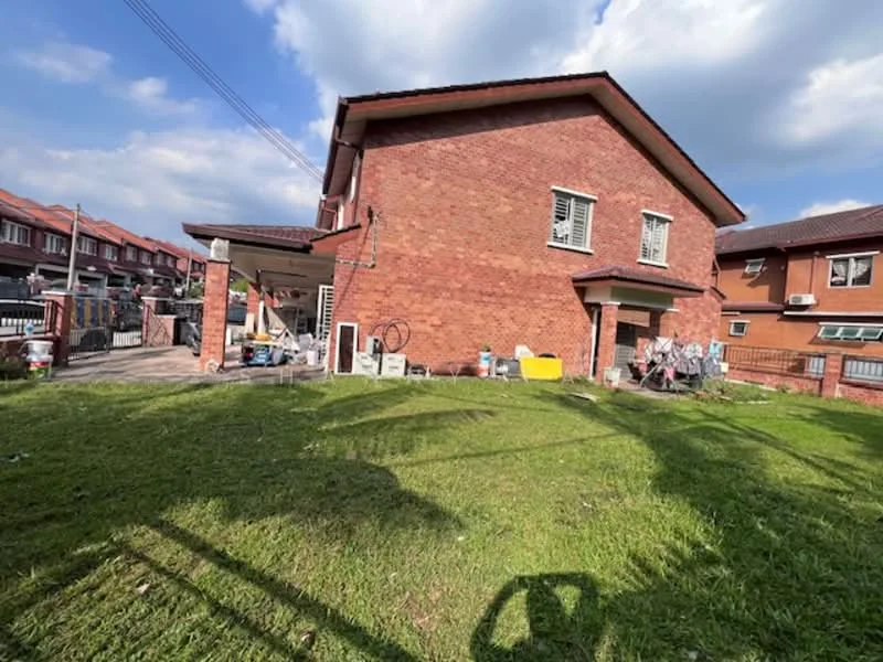 Exterior type: detached bungalow; features: red brick facade, flat roof, manicured lawn, driveway, outdoor storage area, windows with grills, side entrance, surrounded by residential buildings; style: modern.