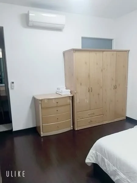 Bedroom features: wooden wardrobe with multiple doors, wooden dresser with drawers, white bed linens, dark wood flooring, wall-mounted air conditioning unit, neutral wall color, window with no visible treatment, light fixture on ceiling; style: modern.