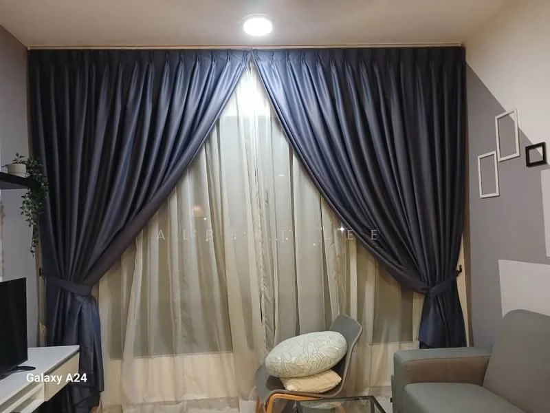 Living features: grey fabric sofa, decorative cushion, floor-to-ceiling windows, sheer curtains, dark blue drapes, wall-mounted TV, light fixture in ceiling, light grey accent wall, white wall with photo frames; style: modern.