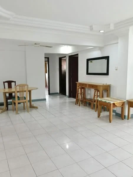 Room features: white painted walls, white tiled flooring, ceiling with decorative moulding, 1 ceiling fan, wooden dining table, 4 wooden chairs, 2 wooden stools, wooden console table, mirror on wall, open layout; style: modern.