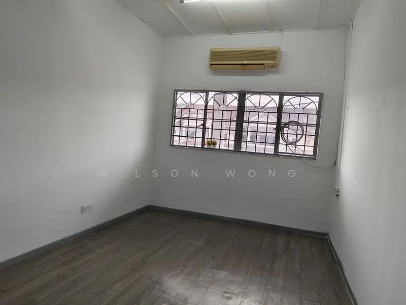 Room features: white painted walls, laminate flooring, 1 wall-mounted split AC, metal window grilles, large window with view, ceiling light fixture.