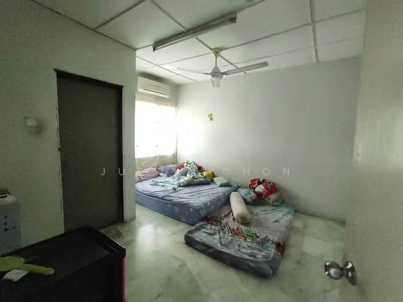 Bedroom features: two single beds with colorful bedding, ceiling fan, window with natural light, white painted walls, marble flooring, air conditioning unit, built-in wardrobe, light-colored curtains.