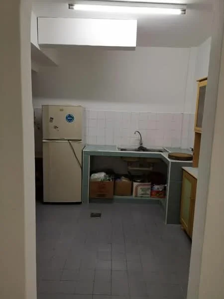 Kitchen features: single-bowl stainless-steel sink, chrome faucet, white tiled backsplash, cream cabinetry, light grey countertop, white fridge, grey tiled flooring, open shelving, box storage, wall-mounted light fixture.