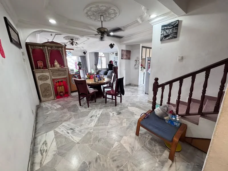 Living features: marble flooring, white painted walls, tray ceiling with decorative moulding, 5-blade ceiling fan, dining table with chairs, wooden cabinet with decorative elements, staircase with wooden railing, area rug, wall-mounted artwork, natural light from windows; style: traditional.