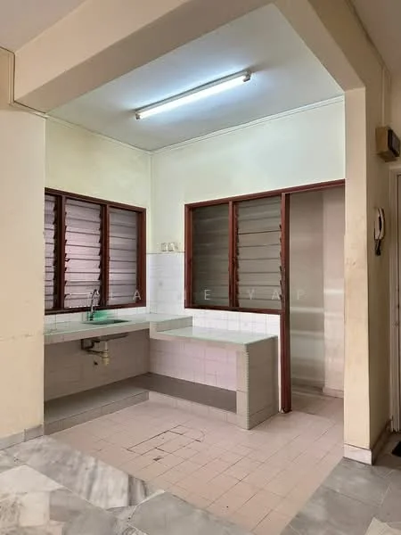 Kitchen features: single-bowl stainless-steel sink, chrome faucet, white tiled backsplash, light grey countertop, white cabinetry, window with wooden shutters, marble tile flooring, fluorescent ceiling light.