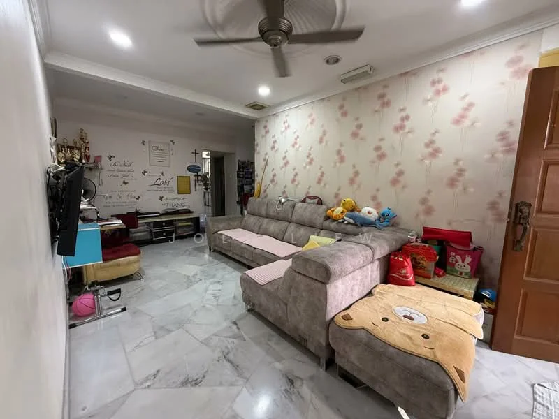 Living features: 3-seater fabric sofa in grey, marble flooring, wall-mounted TV, decorative wall with floral wallpaper, ceiling fan, wooden door, decorative cushions, storage shelves, plush toys, area rug with animal design; style: modern.