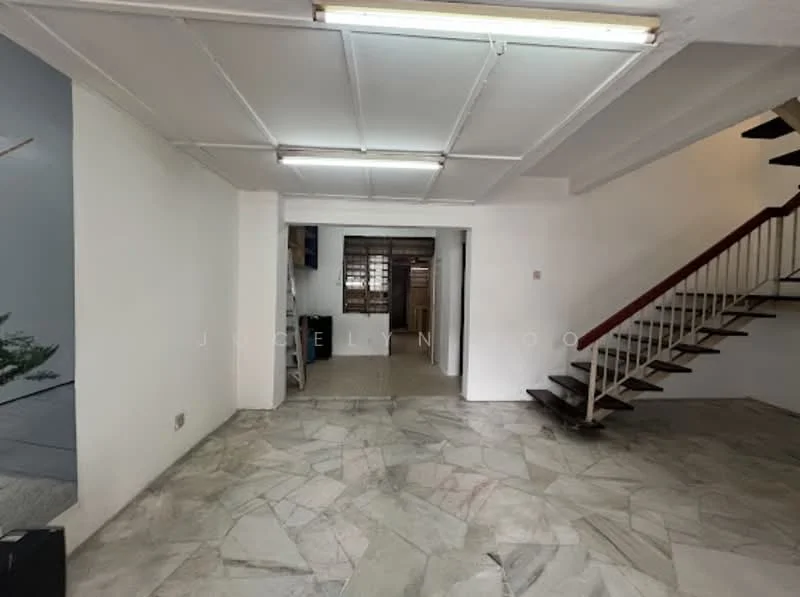 Room features: marble flooring, white painted walls, exposed ceiling with fluorescent lights, staircase with wooden railing, open layout, large windows, doorway leading to another room; style: modern.