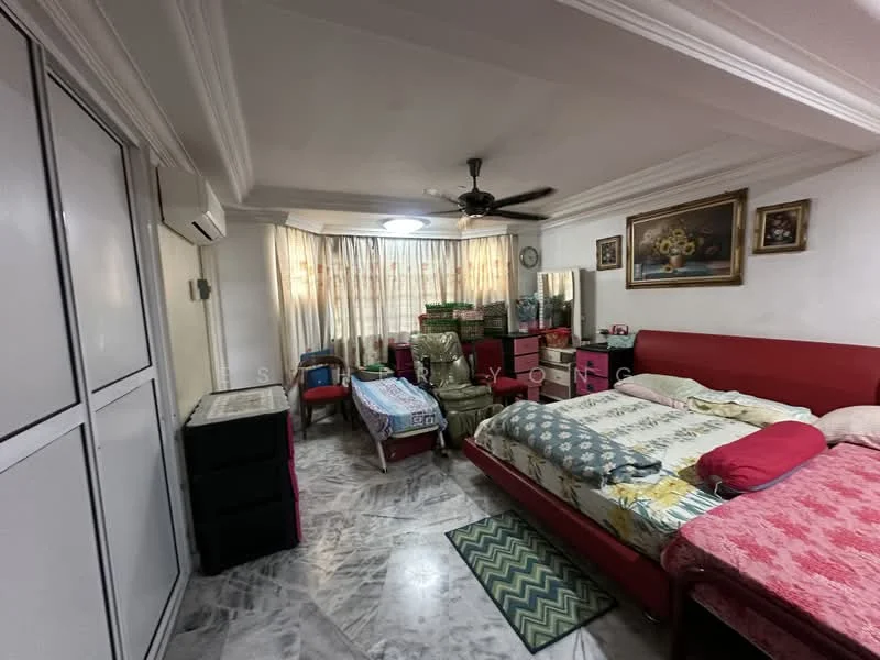 Bedroom features: king-size bed with red upholstered headboard, white bedding with floral pattern, green and white area rug, marble flooring, ceiling fan with light, floor-to-ceiling windows with sheer curtains, built-in wardrobe with sliding doors, wooden dresser with mirror, pink bedside table, green storage boxes, decorative wall art, additional seating area with a small sofa.