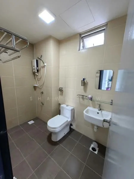Bathroom features: cream tiled walls, grey tiled flooring, one-piece toilet, chrome basin mixer faucet, small wall-mounted sink, framed mirror, shower with handheld shower head, water heater unit, towel rack, window for ventilation; style: modern.