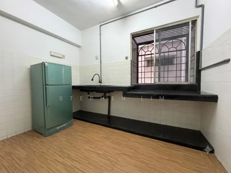 Kitchen features: green fridge, black countertop, single-bowl stainless-steel sink, chrome pull-down faucet, white tiled walls, wood laminate flooring, window with metal grille, wall-mounted pipe, open shelving.