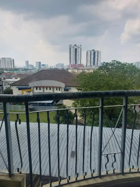 Room features: balcony with railing, metal railing, view of city skyline, cloudy sky, surrounding greenery, nearby high-rise buildings, roof with metal sheeting; view: city.