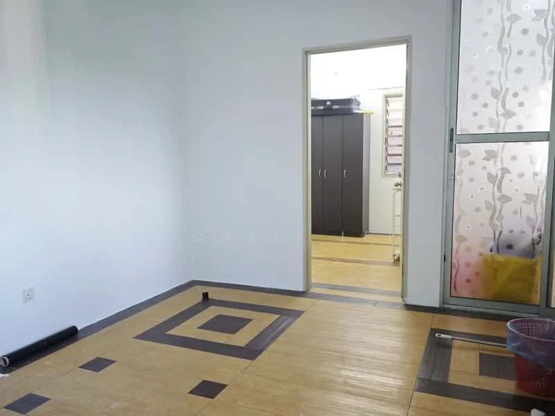Room features: light-colored painted walls, laminate flooring with geometric pattern, doorway leading to another room, sliding glass door with decorative film, built-in wardrobe with dark finish, window with sheer curtains; style: modern.