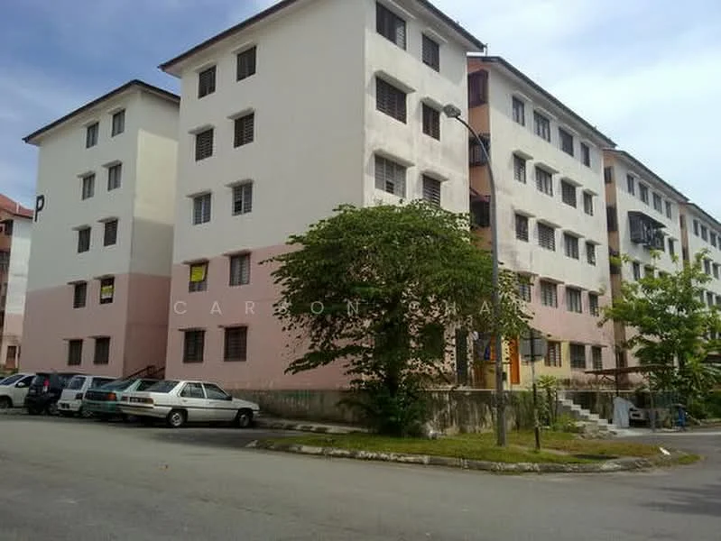 Exterior type: low-rise apartment block; features: white painted facade, pink painted facade, multiple storeys, balconies on upper floors, ground-level parking area, landscaped greenery, street view, windows with security bars; style: traditional.